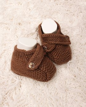 Babyschuhe gekreuzt aus reiner Merinowolle